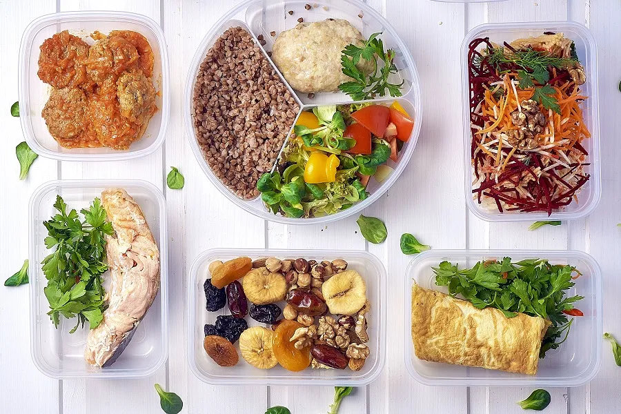 Shared plates with garnishes on linen